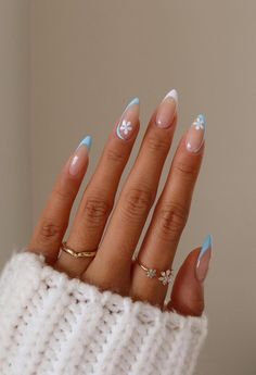 Elevate your manicure with these stunning light blue nail designs, from chic almond shapes to elegant acrylics. For example, we just love these white and pale blue French tip nails with daisies. New Years Nail Designs, Christmas Gel Nails, Pointed Nails, Almond Nails Designs, Christmas Nails Acrylic, New Year's Nails, Acrylic Nail Designs, Blue Nails, French Nails