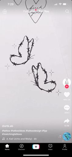 an iphone screen with two hearts drawn on it