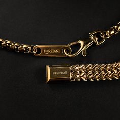 The sharpest set in our collection is the men’s Chevron Box Chain and Link Bracelet. This versatile chain looks fantastic on its own while also being great for layering, and the substantial bracelet is a statement piece, making a bold statement. Show off your style and confidence with this luxurious men’s accessory set. Included: Chain + Bracelet Chain Width: 8mm Bracelet Width: 12mm Chain Length: 26" or 30" Bracelet Size: M, L or XL Core Material: Stainless Steel Finish: Gold PVD Coated Clasp: Luxury Everyday Box Chain Bracelet, Modern Wheat Chain Jewelry As A Gift, Luxury Metal Box Chain Bracelet, Luxury Cuban Link Box Chain Bracelet As Gift, Gold Bracelet Set, Gold Bond, Bracelet Chain, Meaningful Jewelry, Premium Gift