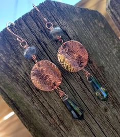 This is a Nice Pair of Boho Hammered Copper Labradorite And Mystic Quartz  Dangle Earrings Comes with Handmade Sterling Silver Ear wires Gift Box or Gift Bag Available for $1.00  $4.75 Shipping to all 50 U.S. States With Tracking. -Please Read before Ordering- The kinds of metals (Sterling Silver, Copper, Brass) used in the jewelry I make are left natural (unsealed) and will develop a natural patina overtime. Metal oxidizes over time when it comes in contact with oxygen in the environment and skin. For many people the acids in your skin combine with the metal and make copper or silver salts which are greenish or gray. They are harmless and just wash off. Copper Earrings Handmade, Brass Jewellery Handmade, Hammered Copper Earrings, Copper Jewelry Handmade, Mystic Quartz, Bronze Earrings, Disc Earrings, Earrings Inspiration, Hammered Copper