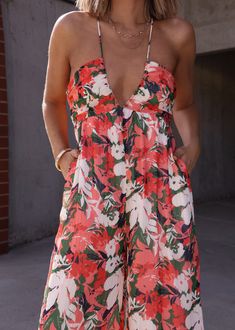 Make a chic statement with our Blossoms Abound Jumpsuit! Featuring a deep v neckline and a delicate floral print, this jumpsuit is perfect for a fun, flirty look. The cross back adds a touch of playful charm to this trendy piece. Perfect for any occasion, from brunch to date night. Fabric 100% polyester New Tops, The Cross, Deep V, Dress Collection, American Girl, Date Night, New Dress, Nice Dresses, Blossom