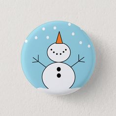 a button with a snowman on it