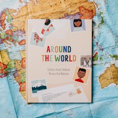 a book about children's travels on a map with the words around the world