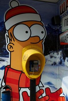 a cartoon character is on the wall next to a parking meter that has been decorated with an image of homer simpson