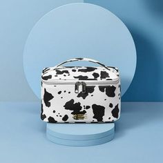 The Cow Print Large Capacity Makeup Bag is a stylish and durable portable travel cosmetics organizer. Made with artificial leather, this multi-purpose toiletry storage bag offers ample space for all your makeup and personal care items. Its unique cow print design adds a touch of fun to your daily routine, while the manual measurement ensures that each bag is crafted with precision and care. Color: Multicolor. Makeup Storage Bag, Hanging Toiletry Bag, Printed Makeup Bag, Cosmetic Bag Set, Cow Pattern, Travel Toiletries, Makeup Bags Travel, Travel Cosmetic Bags, Cosmetic Storage