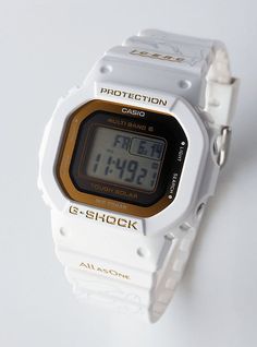 Japan only model This edition commemorates the 30th Anniversary of G-Shock’s partnership with I.C.E.R.C., which started with the release of the DW-6100DW-9 in 1994. This year’s trio of watches have a white and gold color scheme to represent summer and the anniversary celebration. They feature new artwork by Hitomi Arata, with thirty types of whales and dolphins, that adorns the bands and packaging. The bezels and bands are made of bio-based resins, and the packaging is made of recycled cardboard White Watches With Date Display And Rectangular Dial, White Watches With Rectangular Dial And Date Display, White Watch With Date Display As Gift, White Automatic Watch With Rectangular Dial, G Shock Frogman, Gold Color Scheme, Recycled Cardboard, Casio G Shock, 30th Anniversary