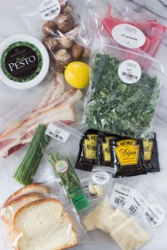 an assortment of food is laid out on the counter