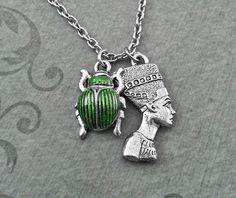 Nefertiti Necklace SMALL Nefertiti Jewelry Egyptian Necklace Egyptian Jewelry Scarab Necklace Silver Green Symbolic Nickel-free Jewelry, Green Nickel-free Collectible Jewelry, Green Metal Collectible Jewelry, Green Metal Necklace With Charms, Green Metal Necklaces With Charms, Vintage Ankh Necklace In Metal, Green Metal Spiritual Necklace, Vintage Ankh Metal Necklace, Green Metal Pendant Charm Necklaces