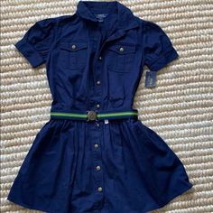 Belt Attached Cotton True To Size Navy Casual Dress With Buttons, Casual Navy Button-up Dress, Navy Cotton Dress With Buttons, Navy Fitted Button-up Dress, Preppy Buttoned Dresses For Spring, Navy Short Sleeve Button Dress, Navy Short Sleeve Dress With Buttons, Fitted Blue Preppy Dresses, Girls Belts