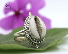 Cowrie Shell Ring, Solid 925 Sterling Silver Ring, Rope Ring, Statement Ring, Cowrie Silver Ring, Rope Ring, Boho Silver Ring, Handmade Ring All my Designs are original. {_ 925 Sterling Silver Handmade item Materials: Silver Gemstone:.... Gem color: White Band color: Silver  All Size Available _} * This is a classy fine hand-crafted sturdy Band Ring. * This Band Ring is great for casual or dressy wear. * You will receive a Ring like the one in the pictures. * 925 Stamp. * Suitable for use in eve Rope Ring, Rope Rings, Shell Ring, White Band, Cowrie Shell, Ring Handmade, Statement Ring, Solid 925 Sterling Silver, 925 Sterling Silver Ring