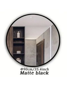 a mirror with the words matte black on it and an image of a bathroom