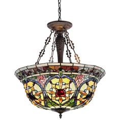 a stained glass chandelier hanging from a chain on an isolated ceiling light fixture