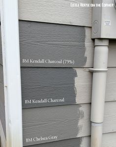 the side of a house with different siding colors