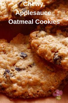 three chewy applesauce oatmeal cookies stacked on top of each other