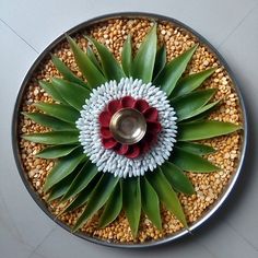 a metal platter filled with lots of food