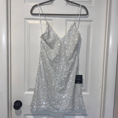 Never Worn! Perfect For A Bachelorette Party. White Sequins Mini Dress White Mini Dress For Prom And Party Season, White Mini Dress For Homecoming Party Season, White Mini Dress For Date Night Holiday, White Mini Dress For Holiday Evenings, Holiday White Sleeveless Mini Dress, White Sleeveless Mini Dress For Holidays, Holiday White Cocktail Mini Dress, White V-neck Mini Dress For Party Season, Teal Green Dress