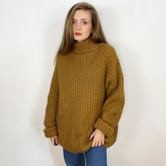 - Knitted oversized turtleneck collar sweater - No tags, estimated mohair or wool and mohair blend - Very good condition, PLEASE NOTE a small hole on the collar - Fits many, please see measurements Measurements (laying flat): Shoulders: 70 cm / 27.6 inches  Armpit to armpit: 64 cm / 25.2 inches  Sleeve length: 66 cm / 26 inches Length: 76 cm / 29.9 inches SHIPPING INFO: Shipping price in the listing is for the "Standard Latvian post shipping". Includes tracking info and takes: * 5-10 business da Oversized Soft Knit Turtleneck, Oversized Knitted Turtleneck For Fall, Oversized Soft Knit Turtleneck Sweater, Oversized Soft Knit Turtleneck For Winter, Winter Solid Color Chunky Knit Turtleneck, Oversized Turtleneck Winter Sweater, Winter Solid Chunky Knit Turtleneck, Winter Chunky Knit Solid Turtleneck, Oversized Fall Turtleneck