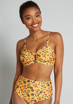 With a flirty, customizable tie-knot at the front, this yellow-hued ModCloth namesake label bikini top is retro spring garden meets Southern California beach vibes. Thanks to its flattering, vintage-inspired design with supportive, adjustable cami straps, padded cups at the bust, and an adjustable back clasp closure, this swim top is made to keep you feeling and looking your best during the warmer days ahead. With an exclusive floral print that is made-up of blue and pink blooms on winding vines Vintage Style Swimwear, Gingham Embroidery, Retro Spring, Casual Dresses Plus Size, Midi Dress Plus Size, Tunic Hoodie, Vintage Swimwear, Casual Rompers, California Beach