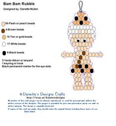 a cross stitch teddy bear ornament is shown in the form of a doll