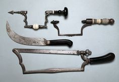 an assortment of old scissors and other tools