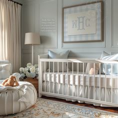 a baby's room with a teddy bear in the crib