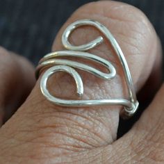 Sterling Silver Heart Ring Adjustable hand by Untwistedsister, $22.00 Unique Handmade Silver Heart Ring, Unique Sterling Silver Heart Ring, Handmade Sterling Silver Open Heart Ring, Diy Wire Jewelry Rings, Wire Jewelry Rings, Wire Wrapped Jewelry Diy, Bijoux Fil Aluminium, Silver Heart Ring, Wire Jewelry Designs