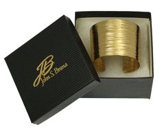 Wrap your wrist in modern elegance when you don this bold Nu-Gold Bark Cuff. The hand-chased texturing and clean lines lends a contemporary feel to the stylish piece. Wear it proudly with everything from work wear to your favorite evening outfits to prove your place on the runway of style. There is no better way to add warmth and shine to an ensemble than with a large statement cuff in gold, but genuine gold bracelets cost a small fortune. The Handmade Nu-Gold Bark Cuff Statement Bracelet lets y Modern Textured Jewelry For Gifts, Modern Textured Jewelry As Gift, Copper Cleaner, 21st Wedding Anniversary, Brass Cuff, Gold Bracelets, Gold Bracelet Cuff, Gold Cuffs, Evening Outfits