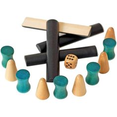 a group of wooden pegs with different shapes and sizes