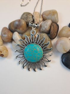 "SUNSHINE Turquoise Howlite Stone Large Pendant Necklace.  Chain is 18\" long.  *Please note that colors may differ slightly due to stone variations.*  All of my designs are Handmade by me in the USA.  Be sure to view my matching pieces.  And THANK YOU for browsing my store!! :)" Bohemian Adjustable Sun Design Necklace, Bohemian Silver Turquoise Necklace For Beach, Bohemian Turquoise Necklace For Vacation, Bohemian Sun Design Necklace For Festivals, Bohemian Jewelry With Sun Design Round Pendant, Bohemian Round Necklace With Sun Design, Bohemian Sun Design Round Pendant Jewelry, Turquoise Round Pendant Necklace For Beach, Bohemian Sun Design Jewelry For Beach