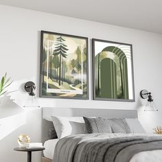 two paintings hang on the wall above a bed