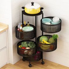 three tiered storage rack in the corner of a kitchen