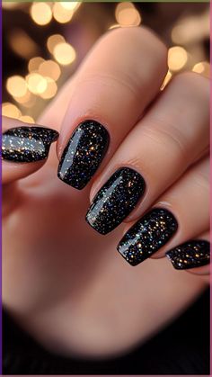 Elevate your Halloween style with short glittery black nails for a touch of spooky glamour. Sparkling and sleek, they’re perfect for a festive, chic look. Click the pin and follow us for more glittery Halloween nail ideas! #GlitteryBlackNails #HalloweenNails #ShortNails #SpookyGlam #NailInspo New Year Dip Nails Design 2024, New Years Nails Black And Rose Gold, Black Nails With Rainbow Glitter, Sparkling Black Nails, Short Square Nails Sparkle, Wedding Nails Bridesmaid Black, Black With Sparkle Nails, Black Nails Gold Glitter, Classy Halloween Nails Short Square