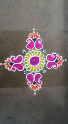 an artistic design on the ground for diwaling to be used as a decoration