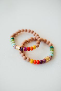 * Bright rainbow diffuser bracelet * Handmade in North Carolina * Features multicolored glass beads and rosewood beads * Choose your own size! * Rosewood beads can be used for diffusing * Perfect for essential oil lovers or those celebrating their miracle rainbow baby! Click to see our other rosewood styles: https://www.etsy.com/shop/KelseyOBrienDesigns?ref=seller-platform-mcnav&section_id=38759716 Pairs well with our plain Jane Diffusers as shown in sample photos!:https://www.etsy.com/listing/1223327880/plain-jane-bracelet-essential-oil ---SIZING--- Choose your desired size from the drop down menu. We want you to feel comfortable while wearing your pieces! If you would like a different size, please make a note at checkout or message us. We will help you find the perfect fit. ---BEADS--- * Cheap Rainbow Bohemian Stretch Bracelet, Cheap Bohemian Rainbow Stretch Bracelet, Cheap Spiritual Rainbow Beaded Bracelets, Rosewood Essential Oil, Essential Oil Bracelet, Bracelet Rainbow, Aromatherapy Jewelry, Miracle Baby, Plain Jane