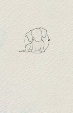 a drawing of an elephant is shown on the side of a white paper with black ink