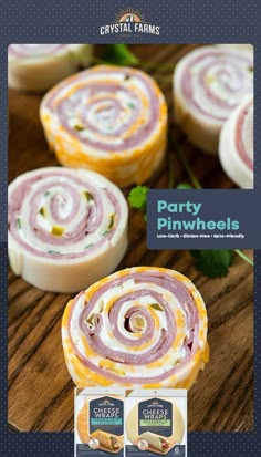 some food that is sitting on top of a wooden table with the words party pinwheels