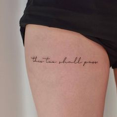 a woman's thigh with the words that are written on it