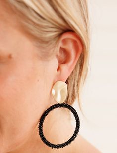 We are in LOVE with these adorable earrings! They offer a dangle style and beaded design for a classic look! The black color offers a neutral tone, complemented by a gold accent for a touch of elegance! The perfect finishing touch to any look! Earrings Black, Gold Accent, Cute Earrings, Neutral Tones, Affordable Fashion, Gold Accents, Classic Looks, The Black, Women's Earrings