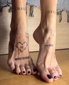 two people with tattoos on their feet and one has the word love written on it