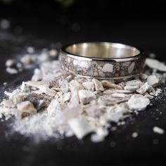 Unveil a piece of history with our Sterling Silver Channel Ring, featuring authentic dinosaur bones encased in crystal-clear UV resin. This timeless and unique ring is available in 4mm, 6mm, and 8mm widths and can be further personalised with custom engraving. For a touch of extra luxury, choose to add diamond dust or meteorite flakes, making this the perfect gift for anyone who appreciates rare and meaningful jewellery with a prehistoric twist. ** After you place an order, we will contact you f Channel Ring, Dinosaur Ring, Dinosaur Bone Ring, Dinosaur Jewelry, Fossil Ring, Bone Ring, Memorial Ring, Meteorite Ring, Diamond Dust