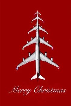 a christmas card with an airplane flying in the sky