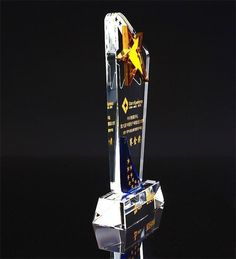 an award is displayed on a black background