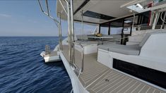 the interior of a boat with an open deck and seating area in the middle of the water