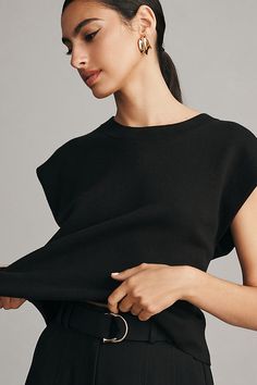 Add a touch of coziness to your close-knit circle. Elevate your sweater selection with the Noah, a versatile, top-rated tank featuring a relaxed, tuck-friendly silhouette and oh-so-fine gauge knit. | The Noah Muscle Tank Sweater by Maeve Top in Black, Women's, Size: XL, Polyester/Polyamide/Viscose at Anthropologie Sleeveless Textured Knit Top For Work, Sleeveless Knit Top For Fall Loungewear, Textured Knit Tank Top For Fall, Fall Textured Knit Tank Top, Everyday Stretch Knit Sweater Vest, Chic Crew Neck Tank Top For Loungewear, Knit Tank Top For Layering With Ribbed Neckline, Versatile Knit Top For Layering, Chic Knit Vest With Crew Neck