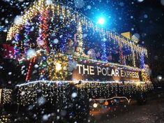 the polar express train is decorated with christmas lights