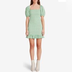 Explore Your Day With A Chic And An Elegant Look Wearing The Bb Dakota X Steve Madden Picnic Vibes Dress. Mini Length Dress With Allover Cute Gingham Pattern. Square Neckline And Short Puff Sleeves. Smocked Pattern Throughout. Ruffled Detailing On The Hem. Pull-On Construction. 80% Polyester, 20% Rayon. Hand Wash, Dry Flat Or Dry-Clean. Cotton Mini Dress For Brunch, Green Mini Dress With Ruffle Hem, Summer Mini Dress With Mini Hem For Day Out, Summer Mini Hem Dress For Brunch, Trendy Summer Mini Dress With Ruffle Hem, Flirty Summer Mini Dress For Picnic, Flirty Mini Dress For Summer Picnic, Green Summer Mini Dress For Picnic, Green Mini Dress For Picnic