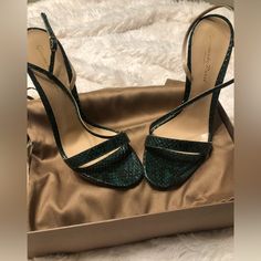 Brand New In Original Box With Dust Bags. Never Worn. These Were Limited Edition! I Bought In A Boutique In Nj A Few Years Ago. Gorgeous Emerald Green Python Skin. 100mm Heel Height. Luxury Green Heels For Cocktail, Elegant Green Heels For Evening, Elegant Green Evening Heels, Elegant Heels For Date Night, Elegant Green Heels With 4-inch Heel, Elegant Leather Heels For Date Night, Chic Green Heels For Events, Elegant Green Heels For Party, Elegant Green Heels With Padded Heel