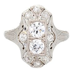 Elegant & finely detailed Belais Art Deco era ring (circa 1920s to 1930s) crafted in 14k white gold.   Two centrally mounted old European cut diamonds are estimated at 0.48 carats each. A further 8 old mine cut diamonds total an estimated 0.42 carats. The total diamond weight is estimated at 1.38 carats (I-J colour and VS2-I2 clarity).      Belais Brothers is a highly regarded and very collectible maker from the late 19th century to the early 20th century. The ring epitomises vintage charm and w Art Deco Diamond Ring, Deco Diamond Ring, Art Deco Diamond Rings, Right Hand Rings, Alternative Engagement Rings, European Cut Diamonds, Art Deco Diamond, Art Deco Era, Fine Jewellery