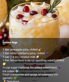 an image of a drink with ingredients in the bottom and on the top, including cranberries