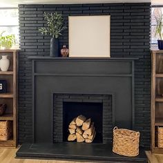 a living room with a fire place and bookshelves on the shelves next to it